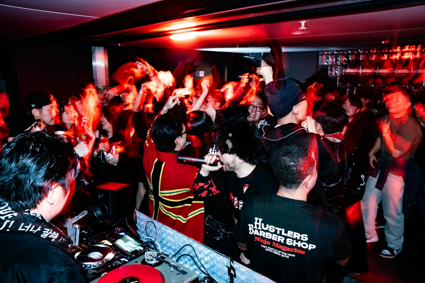 Crowd enjoying an indoor live-music performance